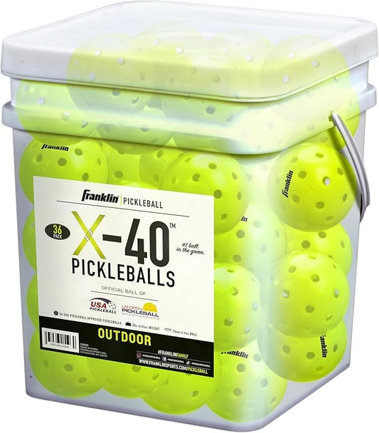 Bucket of Franklin Pickleballs with a label on a white background