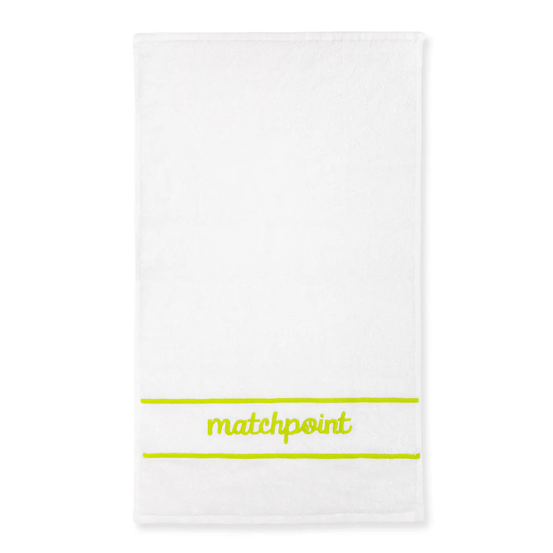A white tennis towel with the word 'matchpoint' embroidered in yellow, with a white background
