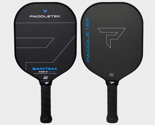 Back paddletek pickleball paddle with blue lettering written on the side and bottom. Shown on a white background.
