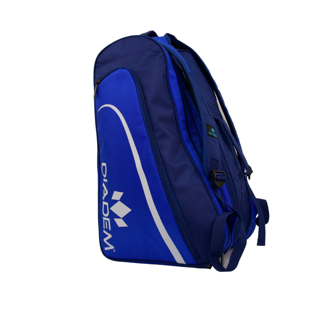 A blue Diadem Tour V2 backpack designed for holding sports equipment, featuring multiple compartments.