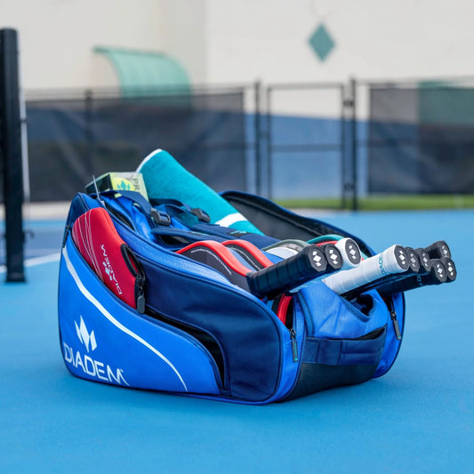 A blue Diadem Tour V2 backpack designed for holding sports equipment, featuring multiple compartments.