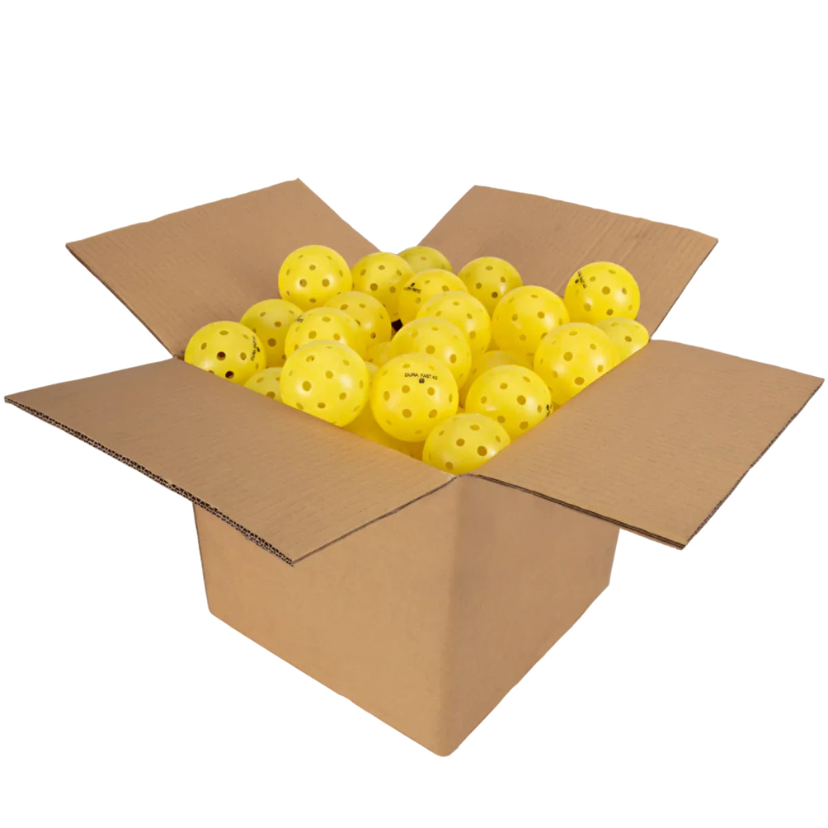 Cardboard box filled with yellow pickle balls on a white background