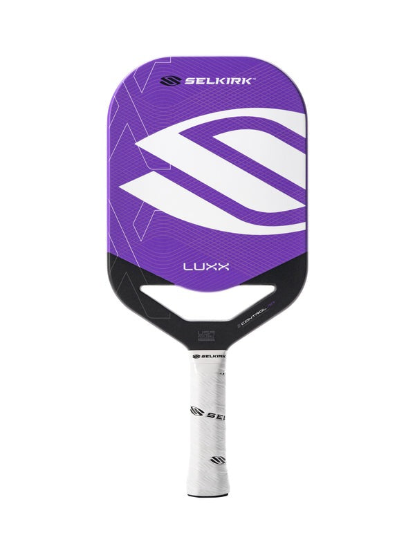 Purple pickleball paddle with Selkirk branding on a white background