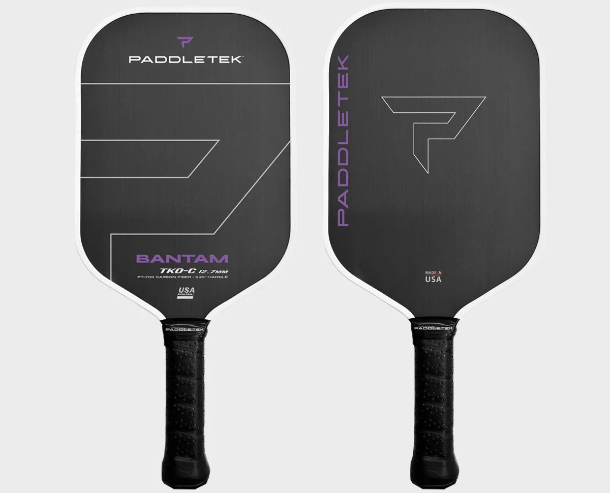 Two Paddletek Bantam TKO-C pickleball paddles, one with a black base and blue details, and the other with a black top and blue base. Both display the Paddletek brand and product name.