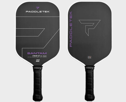 Two Paddletek Bantam TKO-C pickleball paddles, with black coloring and purple lettering , both featuring the Paddletek logo and Christian Alshon's signature.