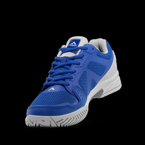 Blue athletic shoe with white sole on a black background