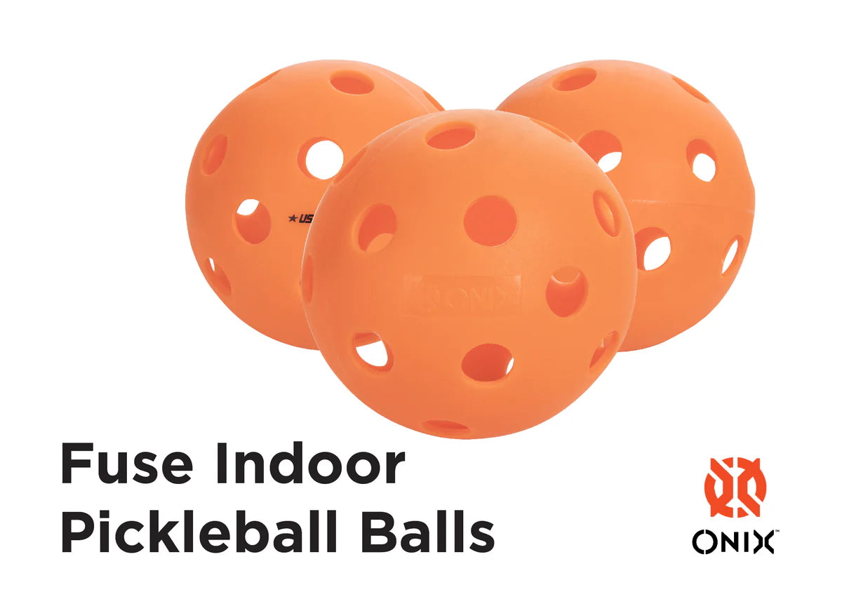 three orange onix fuse indoor pickleballs on a white background