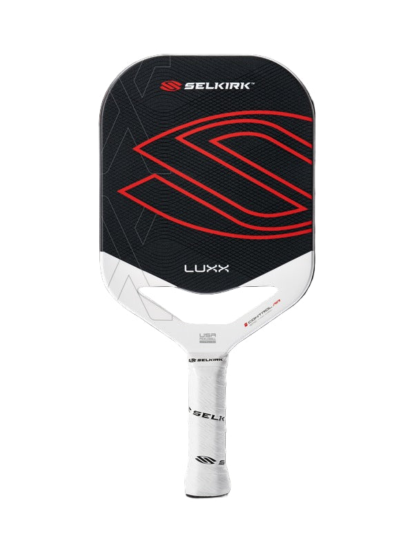 Selkirk Luxx pickleball paddle on a black background