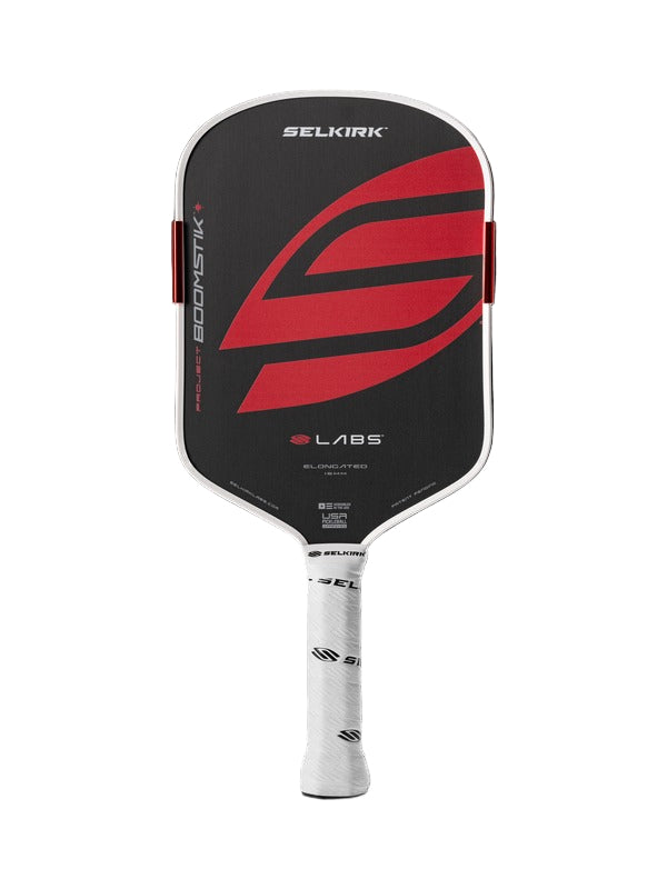 Black and red pickleball paddle with Selkirk branding on a white background