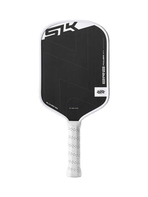 Pickleball paddle with black face and white handle on a black background