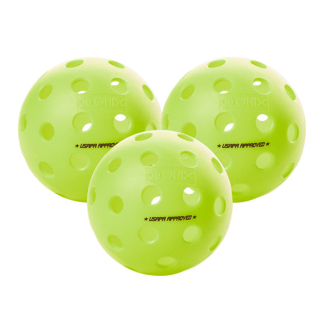 Three green Onix Fuse G2 outdoor pickleballs with 40-hole design, displayed against a white background.