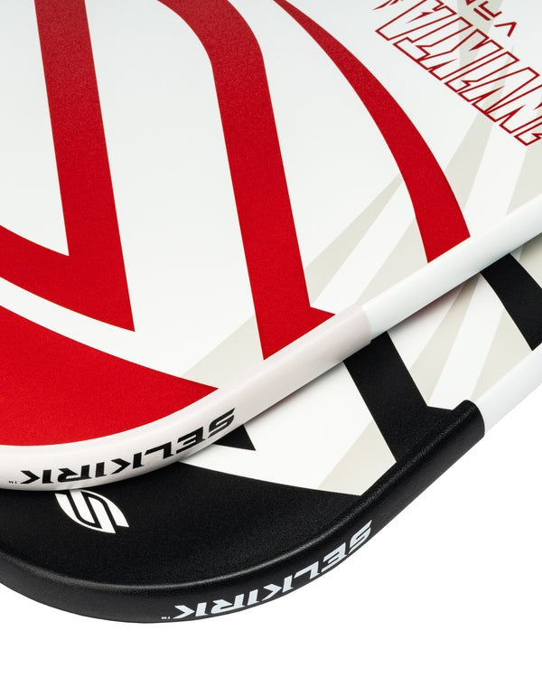 Close-up of a Selkirk paddle with red, white, and black design on a white background