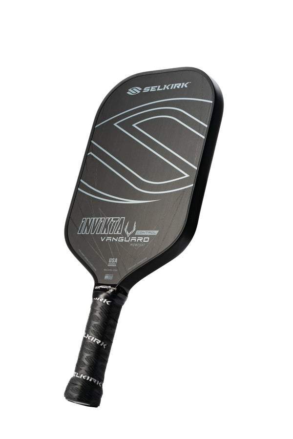 Black and gray pickleball paddle with Selkirk branding on a white background