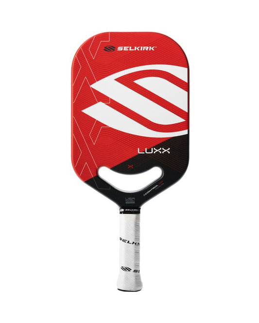 Red and black pickleball paddle with Selkirk branding on a white background