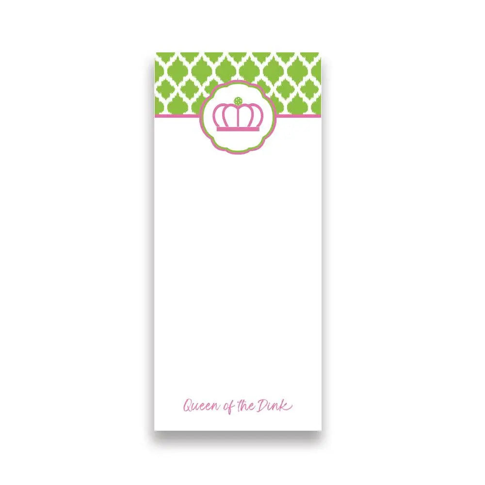 Notepad with green geometric pattern and pink crown design on a white background