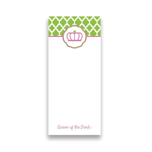 Notepad with green geometric pattern and pink crown design on a white background
