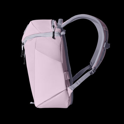 Pink backpack with gray straps on a black background