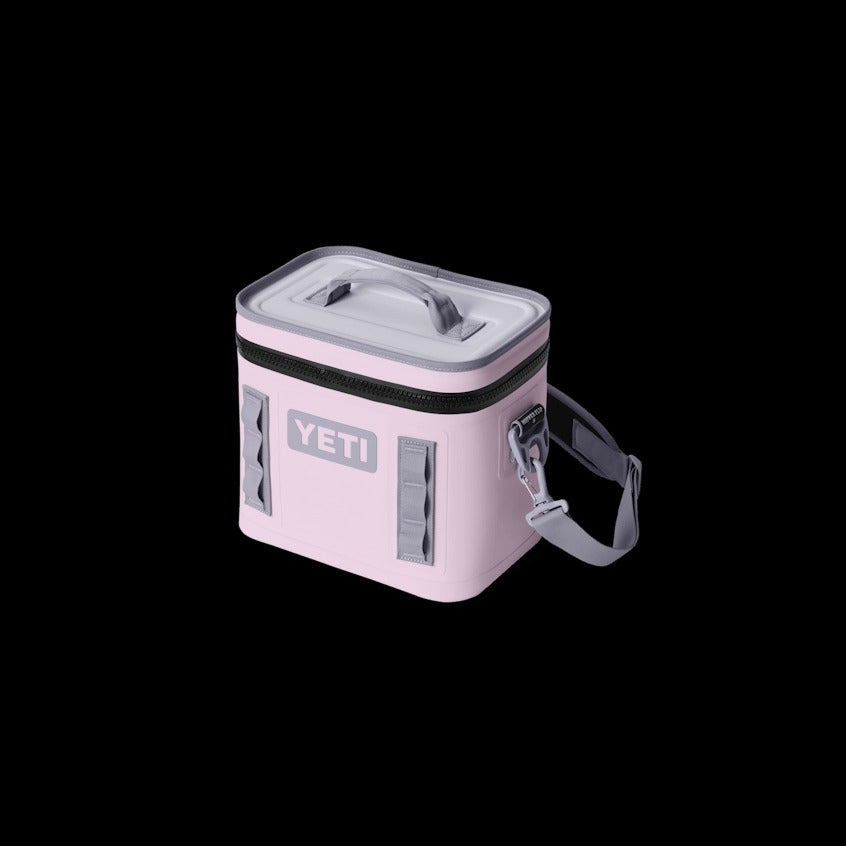 Pink YETI cooler bag on a black background
